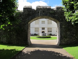 St Fagan's Castle framed by a castle wall